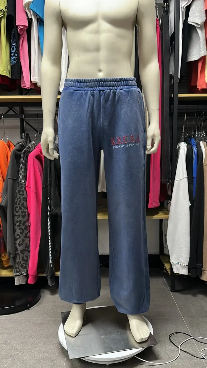 Rhinestone denim with script applique, made by a manufacturer inside Scale System